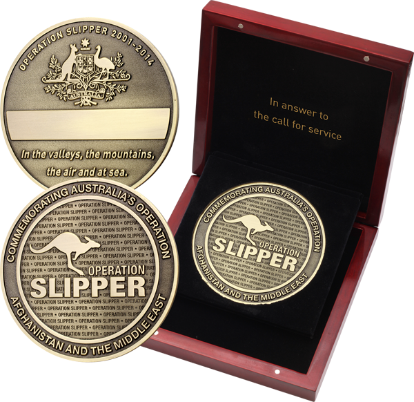 Big brass finish medallion with leaping kangaroo and words Operation Slipper on obverse surrounded by the words 
