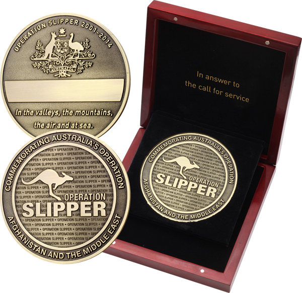 Big brass finish medallion with leaping kangaroo and words Operation Slipper on obverse surrounded by the words
